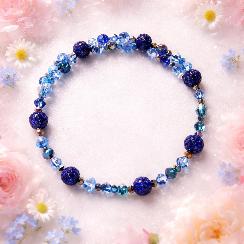A Dainty Memory Wire Choker In Shades Of Blue Glass And Poly Clay Beads. 18"